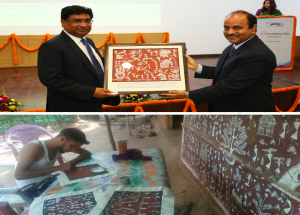 NHSRCL felicitated Shri V. K. Yadav, Chairman, Indian Railway Board, with Warli Painting created by one of the project affected people from Palghar district at 4th Foundation Day on 12th February 2020