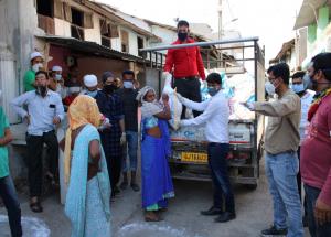 Food items being delivered to daily wage earners and tribal families in Bharuch district