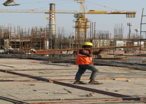 A construction worker at Sabarmati Hub construction site