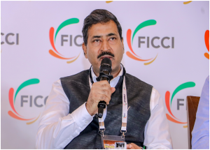 Shri Vivek Kumar Gupta, MD/NHSRCL speaking at the FICCI Smart Railways Conclave on 26th July 2024