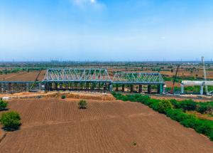 130 m long span of steel bridge launched over Indian railway tracks for Mumbai-Ahmedabad Bullet Train Project