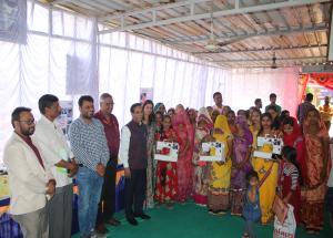 NHSRCL gifted sewing machines to 23 women from Chenpur and Ropda villages in Ahmedabad to enhance income generation opportunities for them