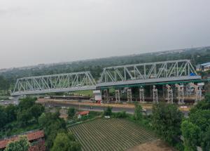 Second 100 m Span of a 2 x 100 m long Steel Bridge Launched over NH - 48 in Gujarat for Mumbai-Ahmedabad Bullet Train Project This is the ninth steel bridge completed for the project